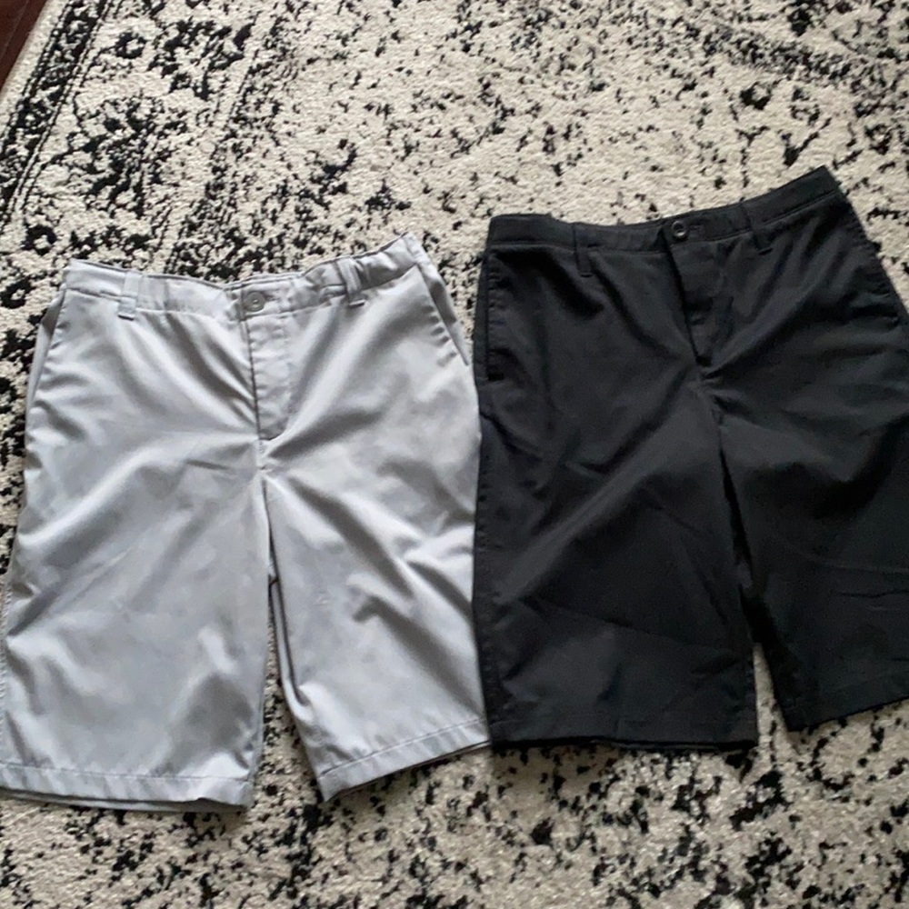 Two amazing under Armour golf shorts size 16
